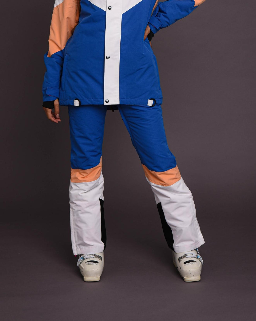 https://us.oosc-clothing.com/cdn/shop/products/Blue-peach-white-womens-ski-pants.jpg?v=1667244012&width=1080
